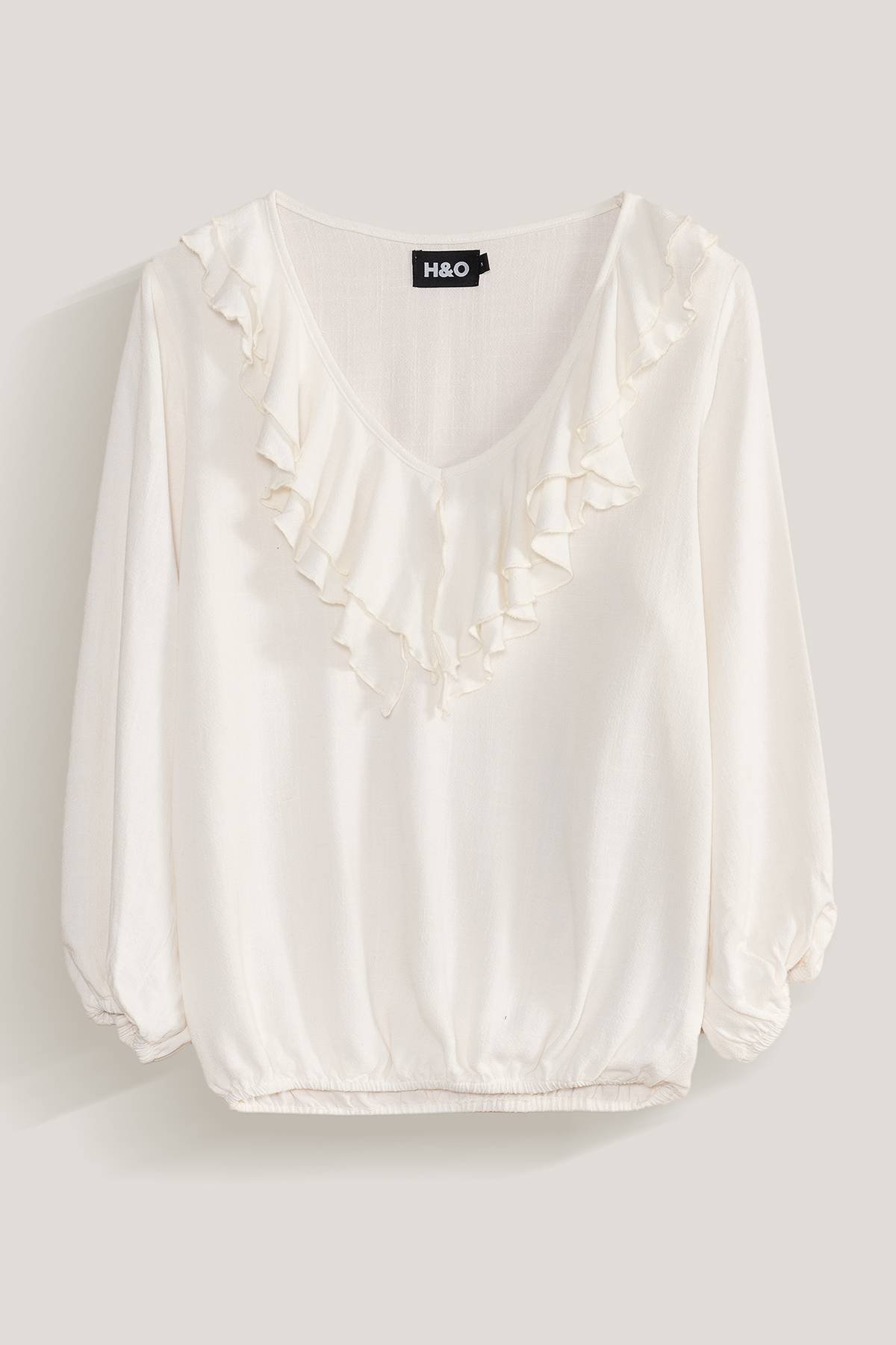 Blusa con vuelos en pecho H O